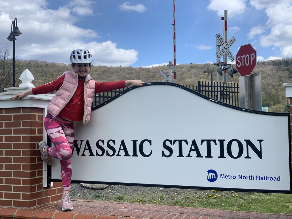 Fourth-grader Addie Brown rides the Rail Trail for NECC