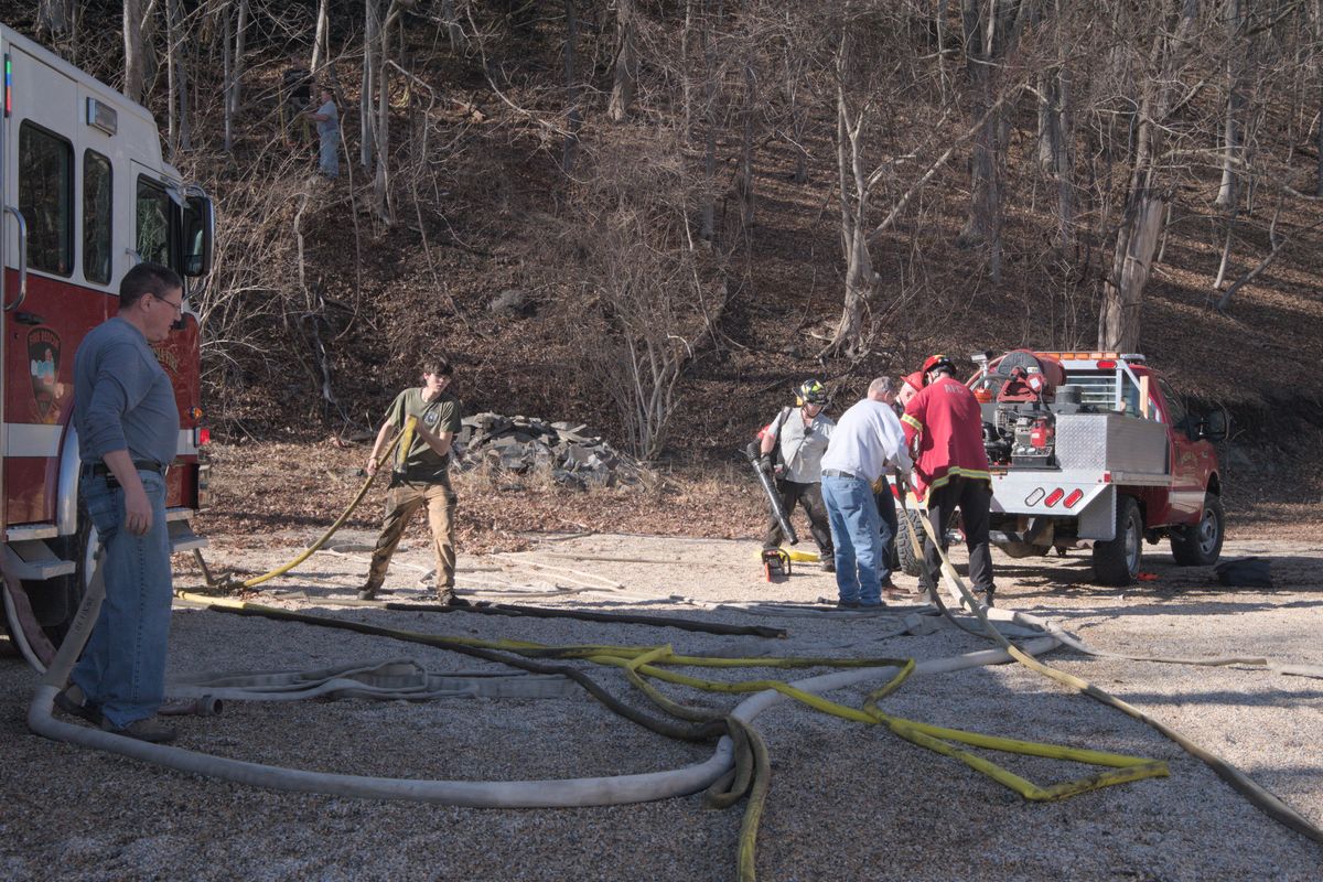 Burn barrel fire spreads to brush in downtown Amenia