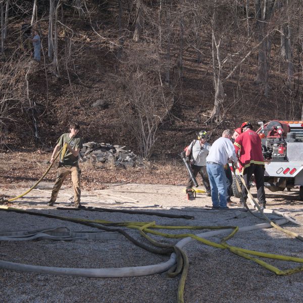 Burn barrel fire spreads to brush in downtown Amenia