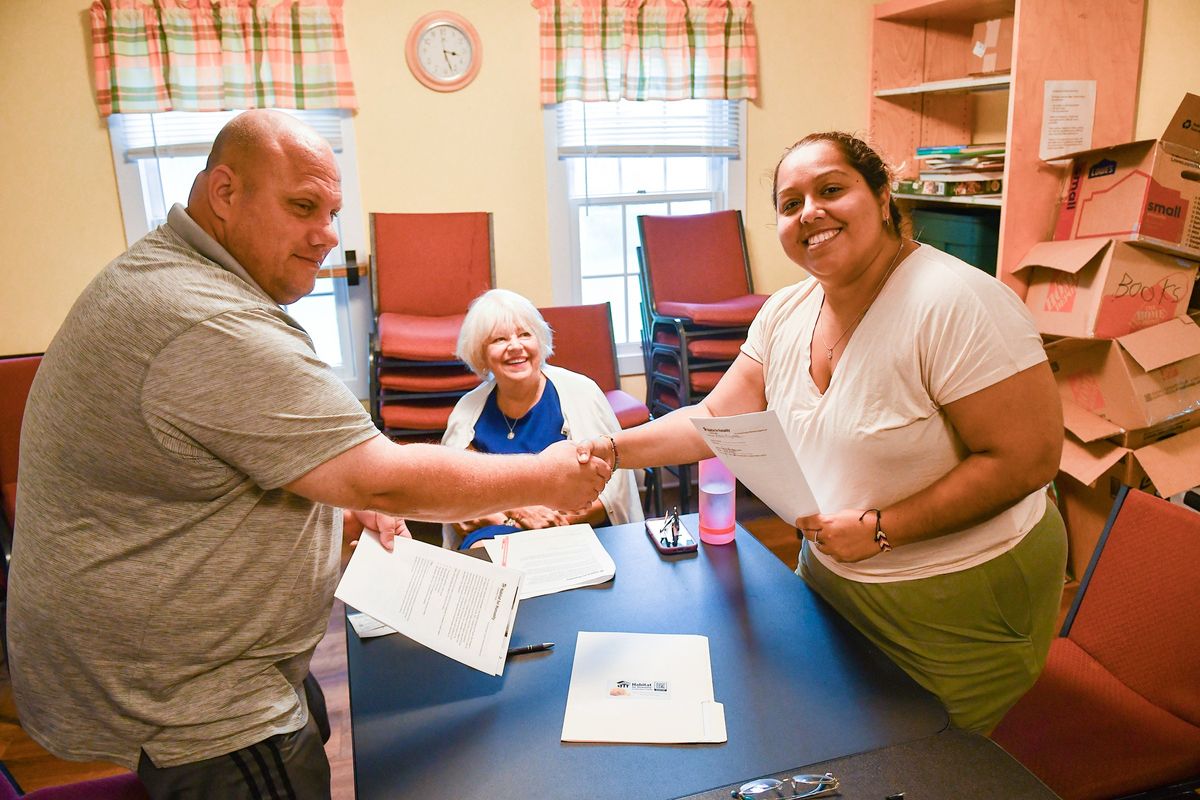 Family to buy
first Habitat for Humanity house