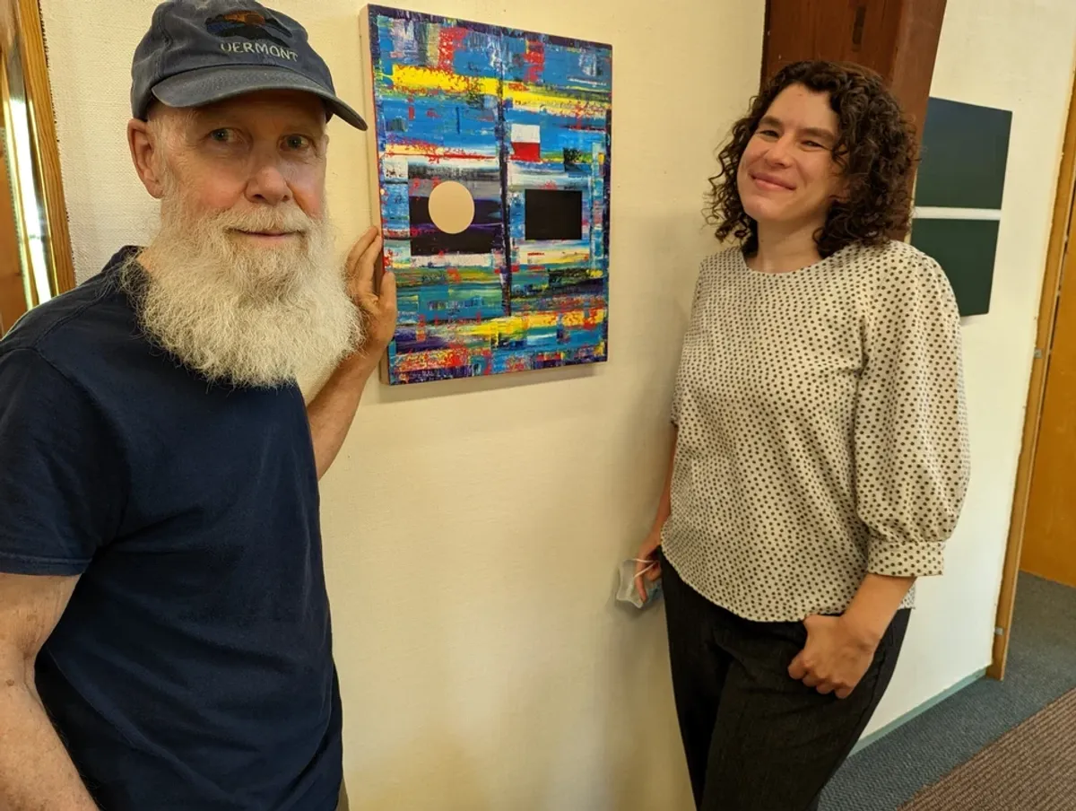 Artist donates paintings to library