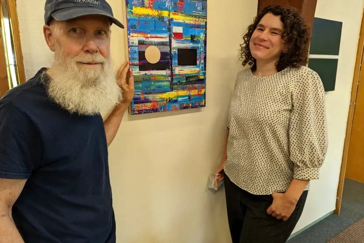 Artist donates paintings to library