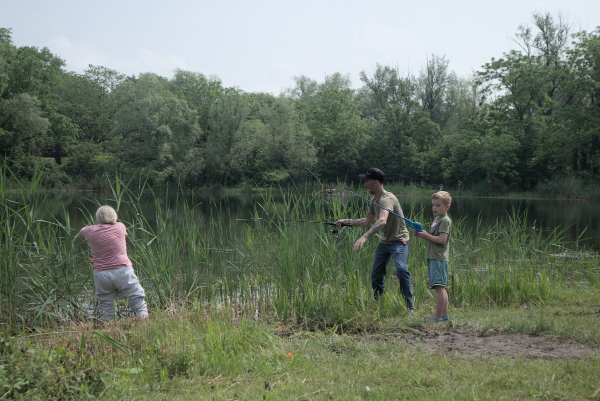 Young anglers enjoy sunny skies and muddy puddles