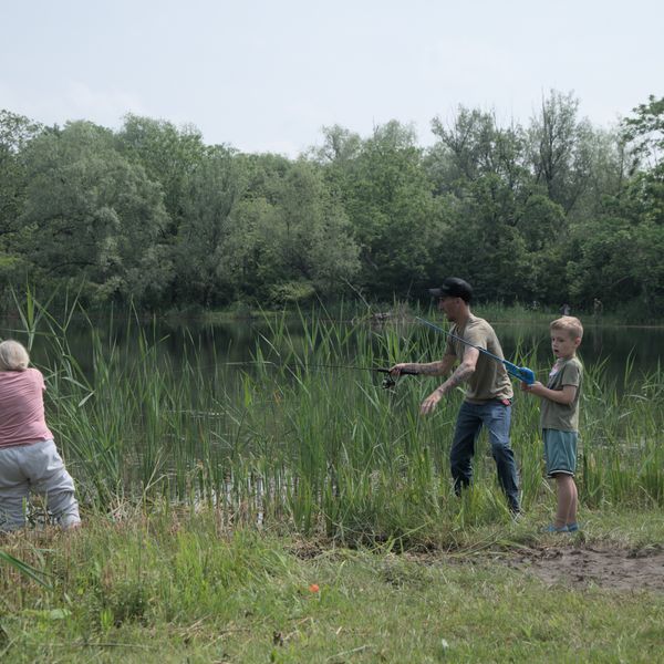 Young anglers enjoy sunny skies and muddy puddles