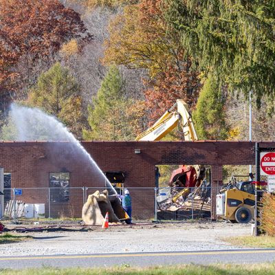 Demolition of Millerton’s fire-damaged highway and water building begins