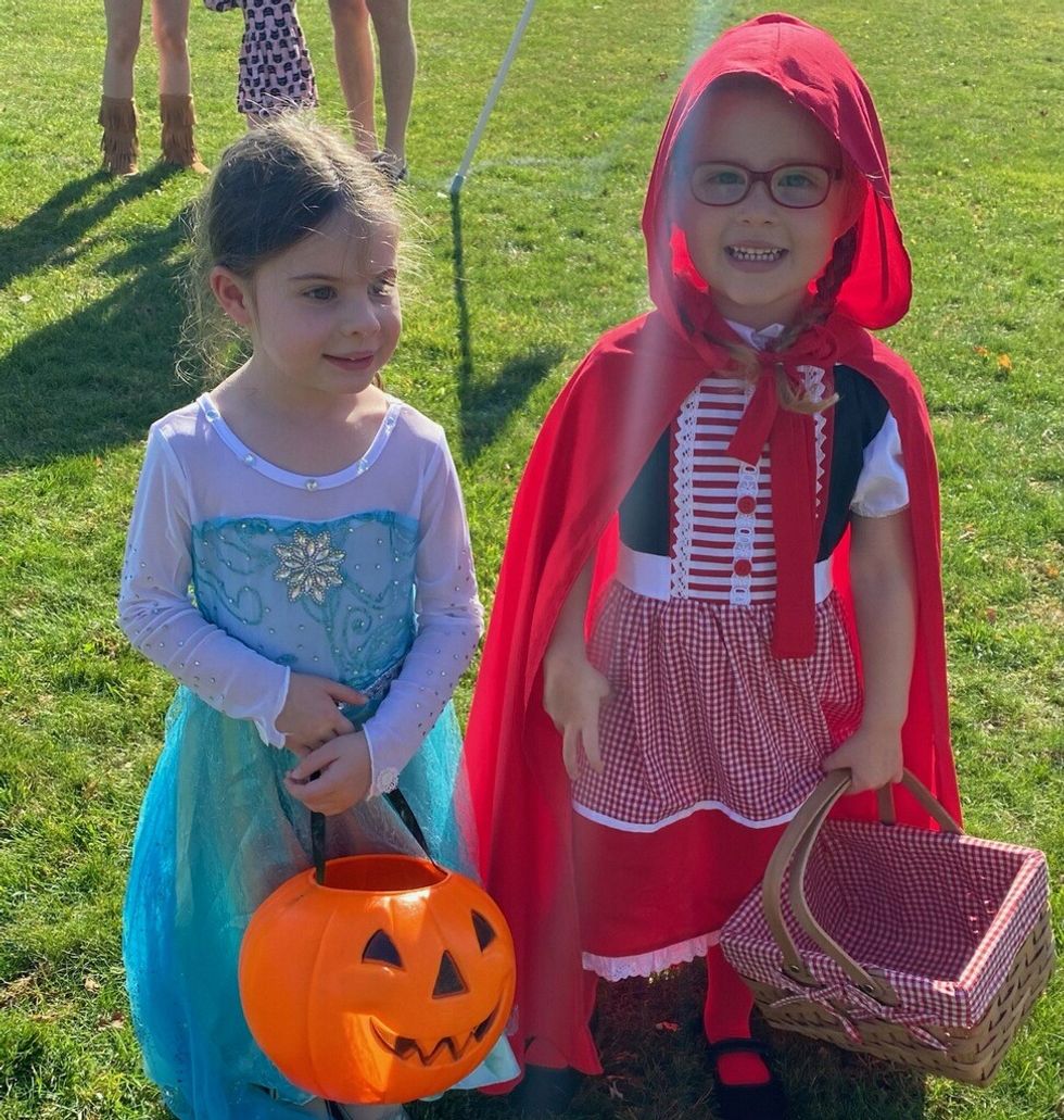 Children in costume parade for treats in Millbrook