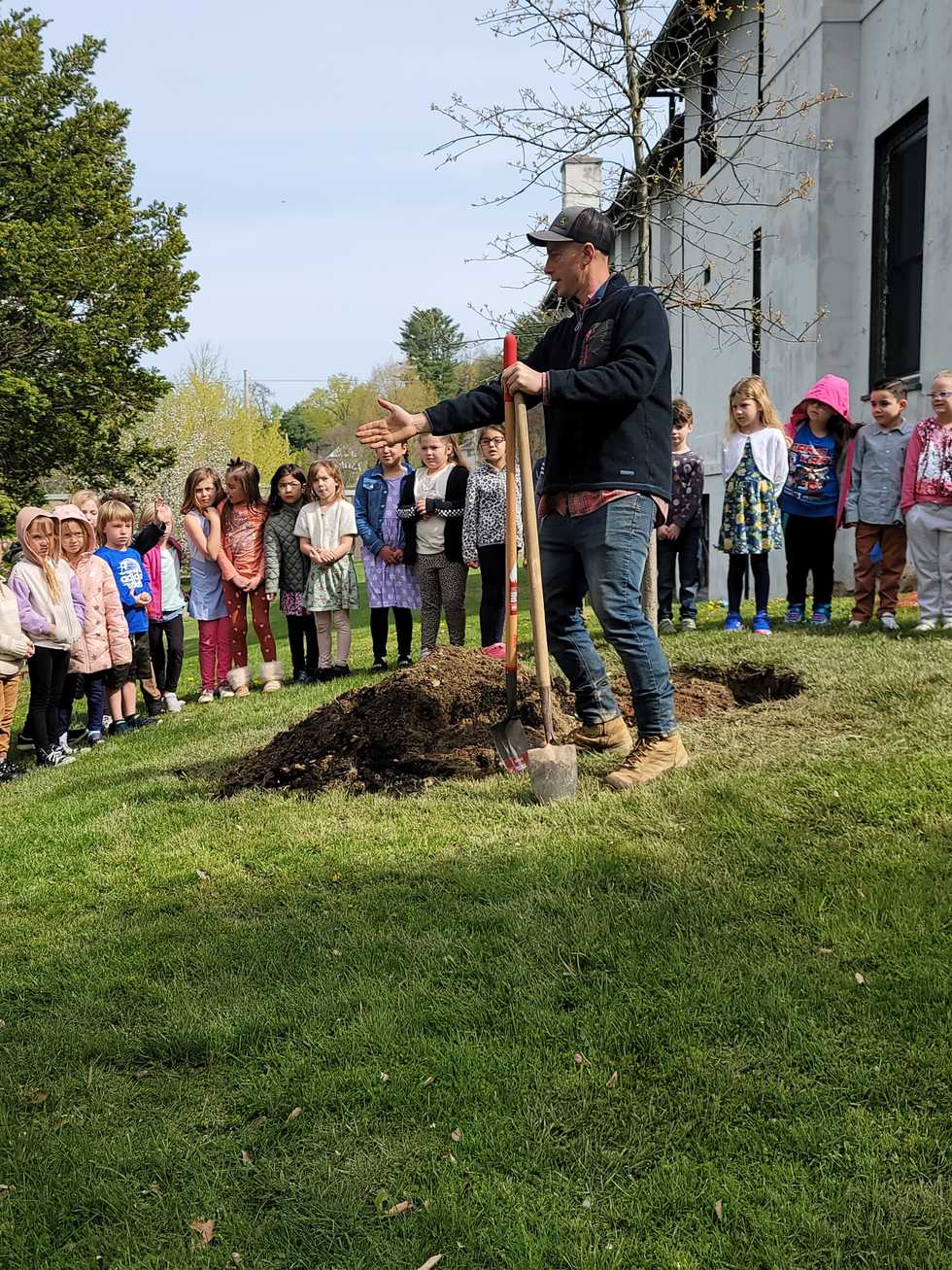 Kids help with Arbor Day