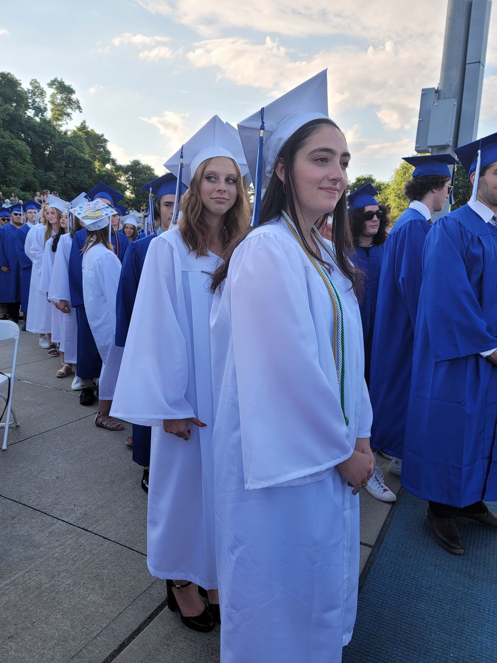 Millbrook High School: High hopes shared as graduates toss their caps high into the air