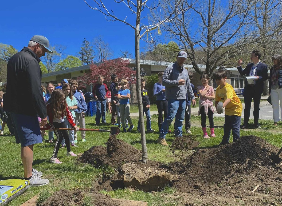 Alden Place students get dirty for Arbor Day