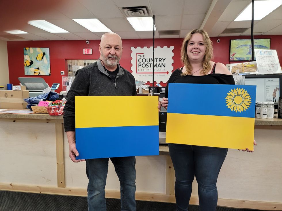 Country Postman waves flag for Ukraine