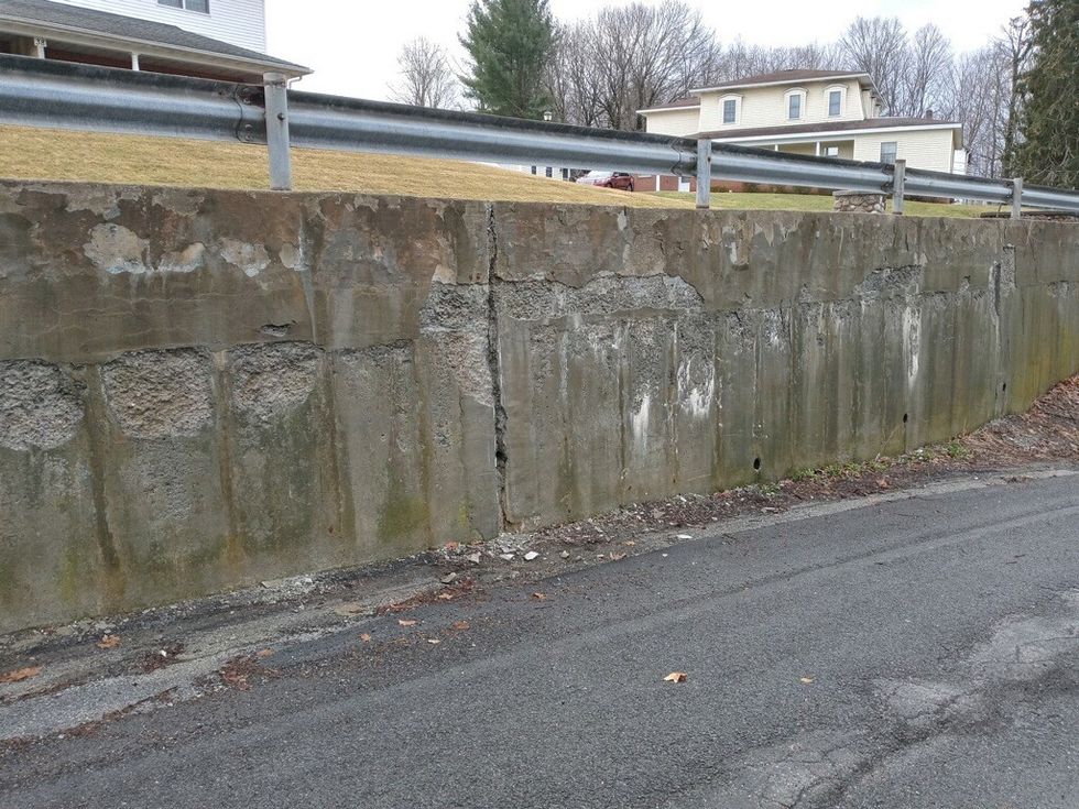 Village Board accepts bid to fix damaged retaining wall