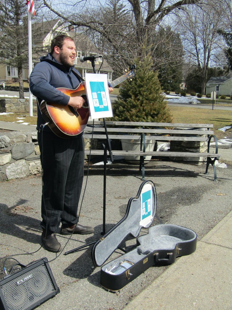 Strumming on the streets of Millerton