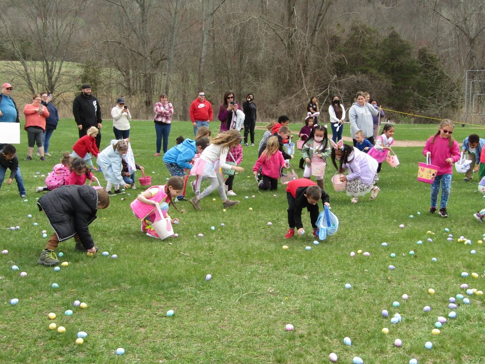 Dover children roll along, hunting for Easter eggs at Boyce Park